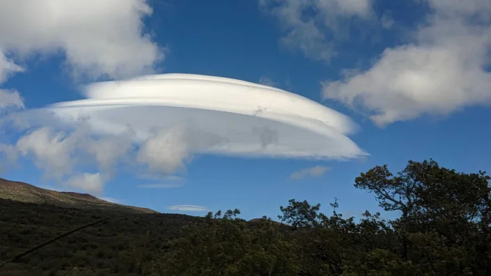 Unidentified Flying Object-Shaped Clouds Spotted Over Keck Observatory in Hawaii Skies